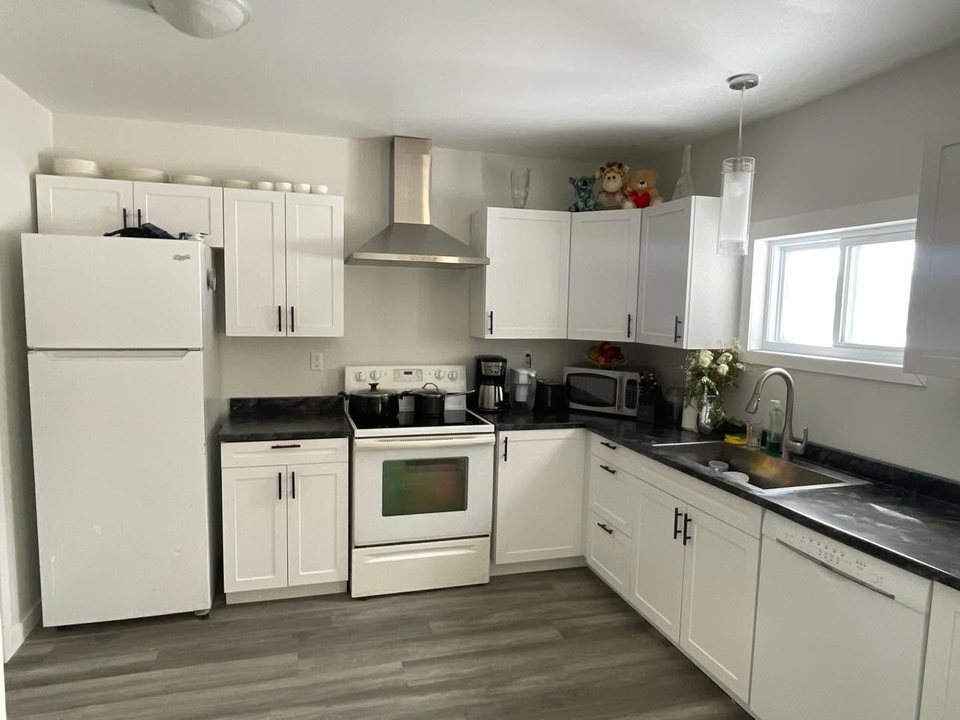 Finished white kitchen with new cabinets and countertops
